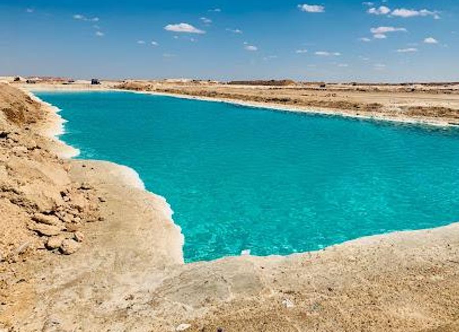 Experience the tranquil beauty of Siwa's Salt Lakes, a natural spa retreat in Egypt's stunning desert landscapes, perfect for relaxation and rejuvenation.