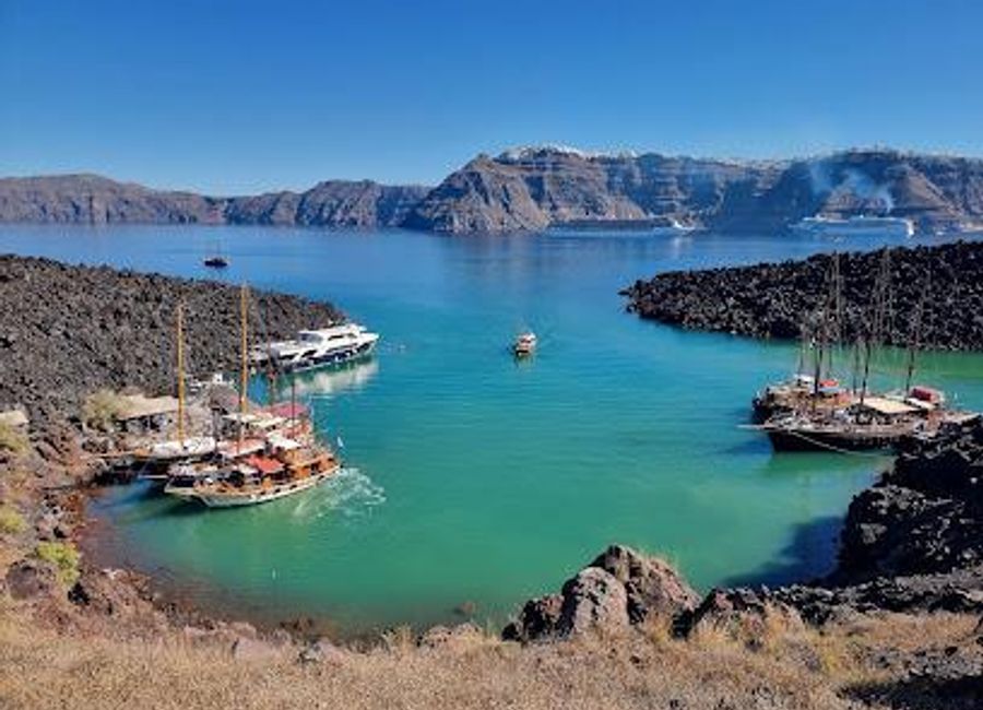 Experience Nea Kameni, a volcanic island in Santorini, where adventure meets breathtaking natural beauty and rich geological history.