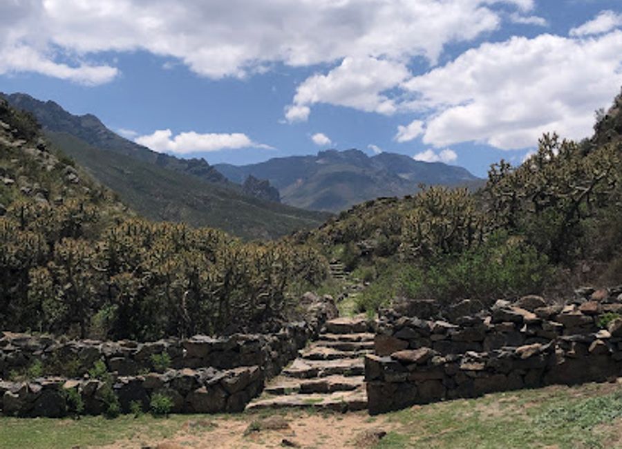 Discover the ancient wonders of Piedra Intihuatana in Chivay, Peru - a sacred site steeped in Incan history and breathtaking Andean beauty.