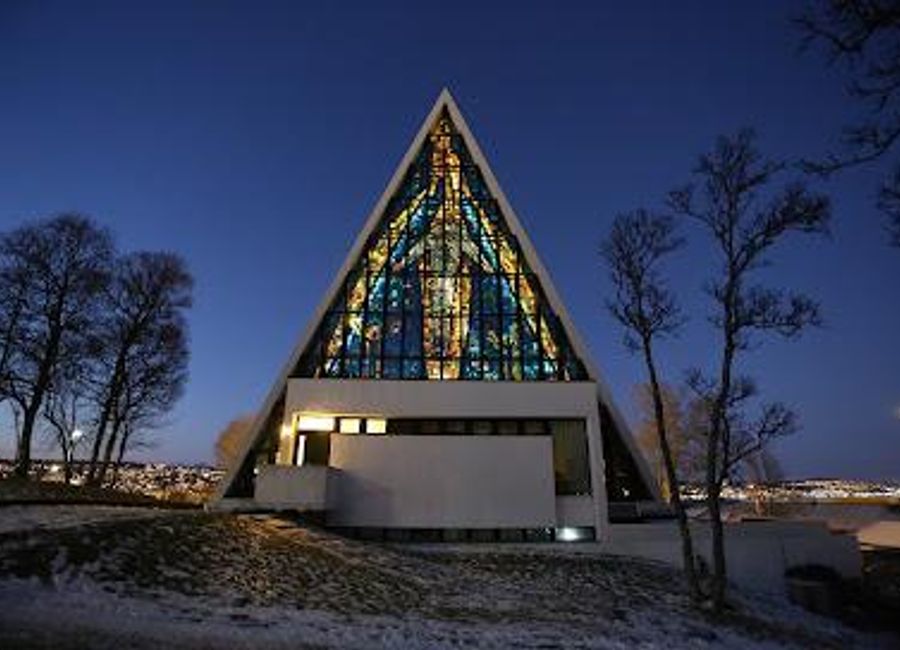 Discover the Arctic Cathedral: an architectural wonder in Tromsdalen, Norway, blending modern design with stunning natural beauty.
