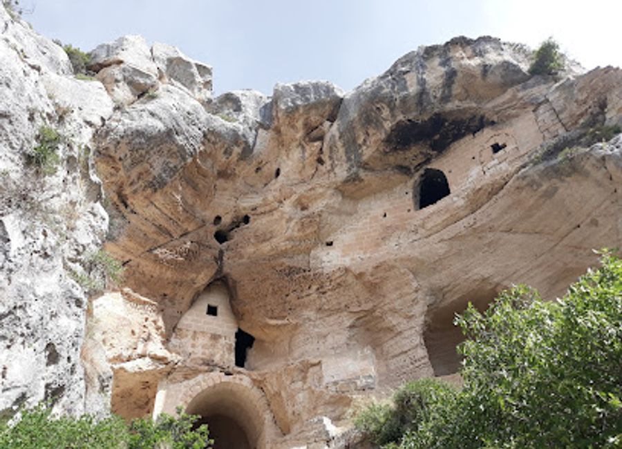 Discover the historic Chiesa Rupestre di San Nicola all'Ofra, a breathtaking cave church in Matera, showcasing stunning frescoes and medieval architecture.