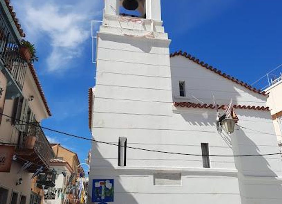 Discover the spiritual and architectural beauty of the Church of Saint Spyridon in Nafplion, a serene landmark steeped in Greek Orthodox tradition.