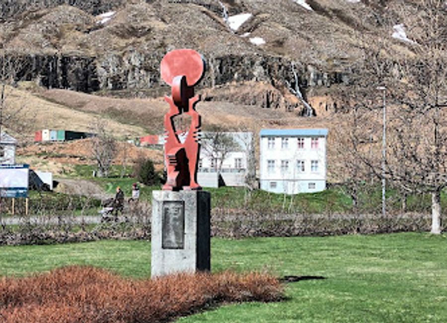 Discover the T. Larusson Monument in Seydisfjordur, a stunning tribute to local heritage surrounded by breathtaking Icelandic landscapes.