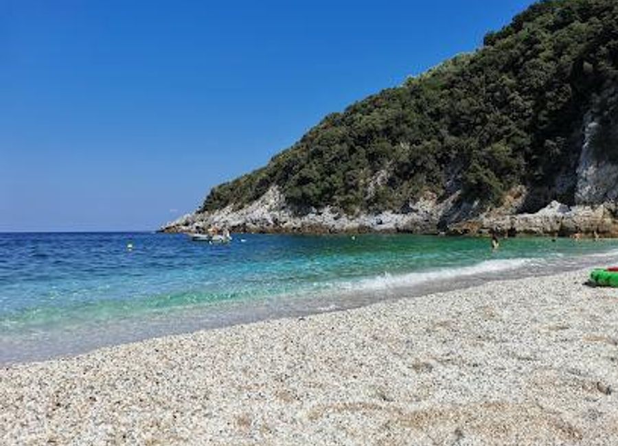Experience the tranquil beauty of Limnionas Beach, a hidden gem in Greece known for its crystal-clear waters and serene surroundings.
