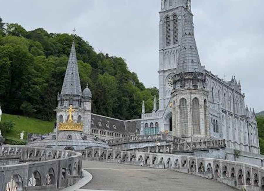 Discover the spiritual heart of Lourdes at the Basilica of the Immaculate Conception, a stunning Gothic Revival masterpiece offering panoramic views and a serene atmosphere for reflection.
