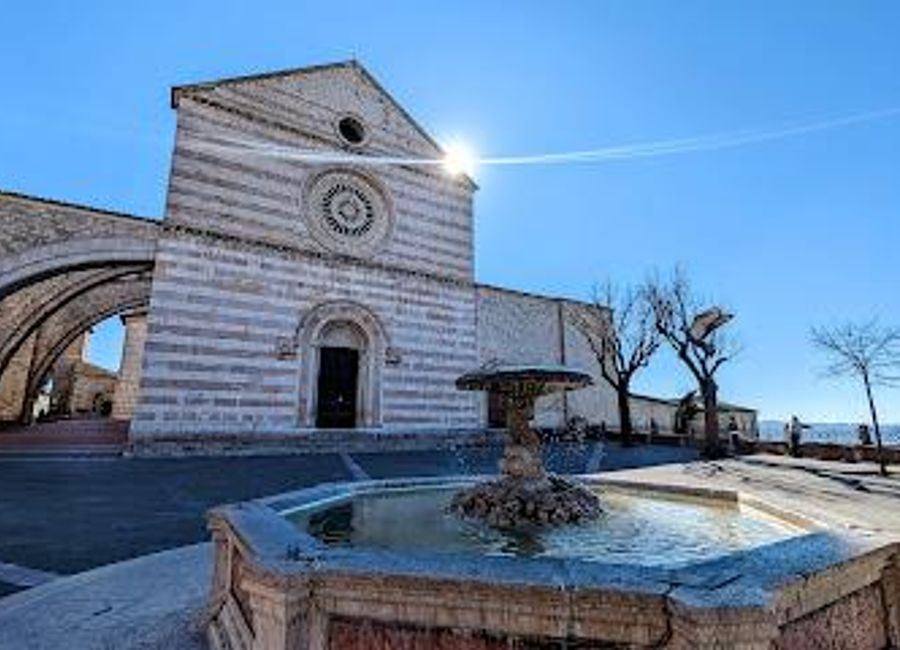 Explore the Basilica di Santa Chiara in Assisi, a captivating blend of Gothic architecture and spiritual history, home to St. Clare's legacy.