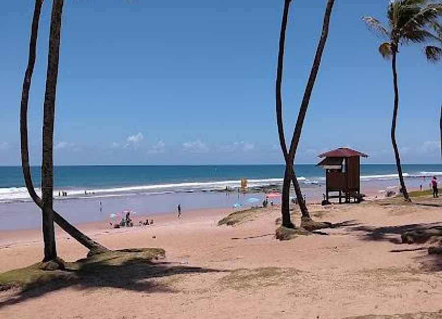 Experience the serene beauty of Praia de Villas do Atlântico, a stunning beach in Lauro de Freitas, Bahia, perfect for relaxation and adventure.
