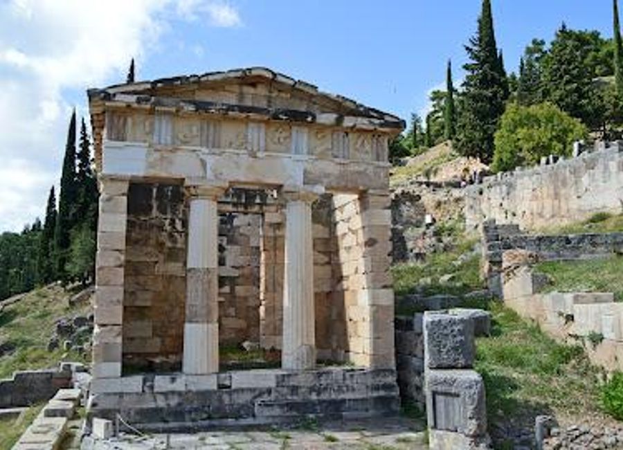 Explore the Athenian Treasury in Delphi, a stunning historical landmark showcasing the grandeur of ancient Greek architecture and culture.