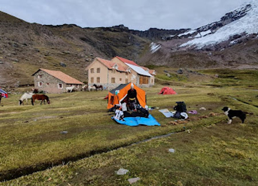 Experience the breathtaking beauty of Campo Base Ausangate, a stunning hiking area in the Peruvian Andes, perfect for adventure seekers and nature lovers.