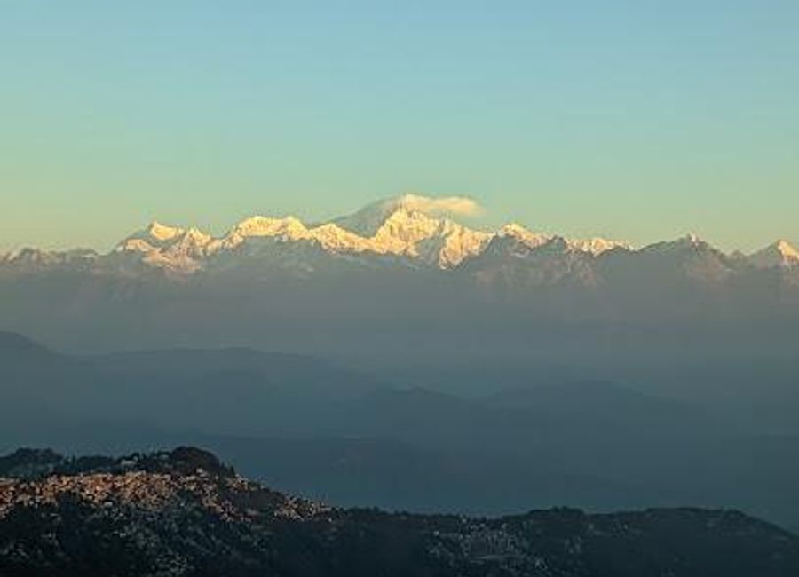 Witness breathtaking sunrise views over the Himalayas from Darjeeling's highest point, a truly unforgettable experience.