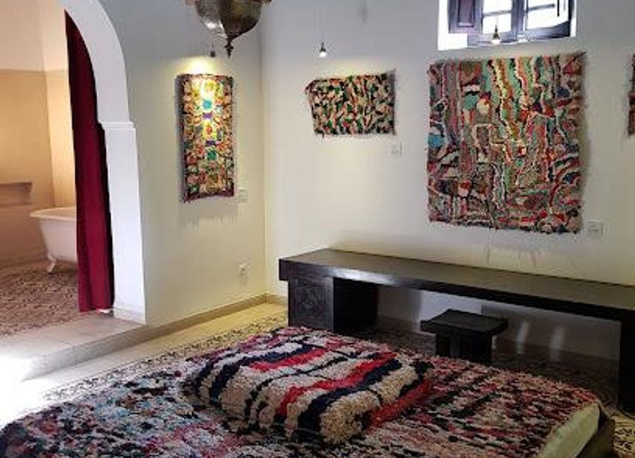 Explore the rich tapestry of Moroccan heritage at Musee Boucharouite in Marrakech, where traditional textiles come to life in a captivating cultural experience.
