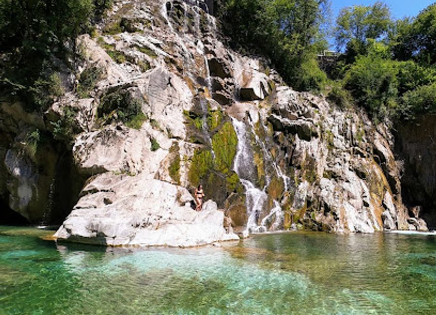 Discover the tranquil beauty of Crosis Waterfall, a stunning natural attraction in the Province of Udine, perfect for nature lovers and adventure seekers.