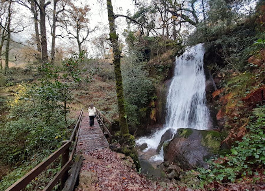 Explore the stunning Cascata da Laja, a breathtaking waterfall in Portugal's Gerês region, surrounded by lush nature and endless adventure.