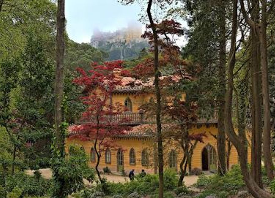 Uncover the romantic charm of the Chalet of the Countess of Edla, a historical landmark with stunning architecture and beautiful gardens in Sintra, Portugal.