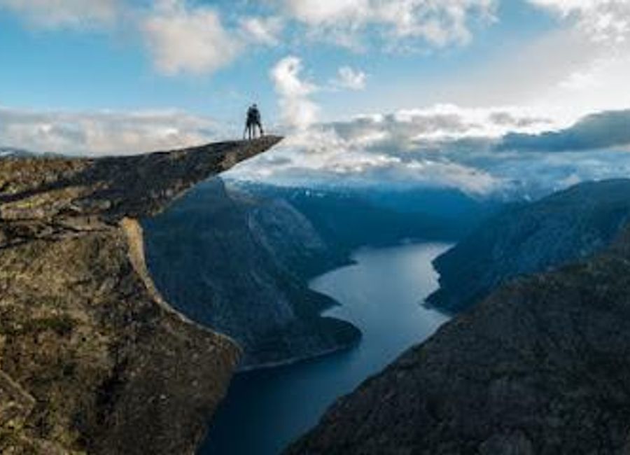Discover the breathtaking beauty of Trolltunga, Norway's iconic rock formation offering stunning views and an unforgettable hiking experience.