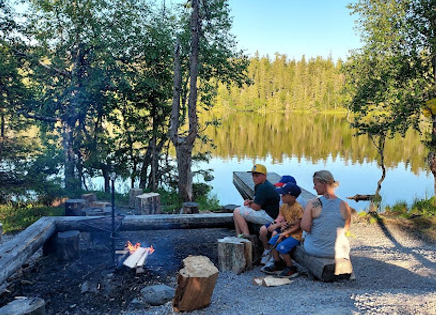 Discover the serene beauty of Valtavaara Pond Shelter in Kuusamo, Finland, a perfect hiking destination for nature lovers and adventure seekers.