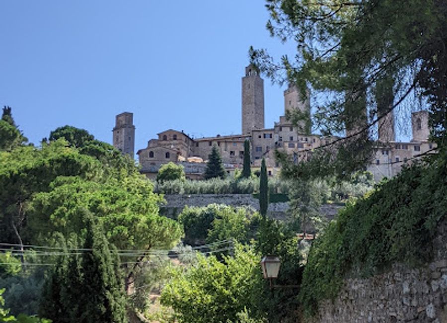 Explore Porta delle Fonti, a historical gateway in San Gimignano, a perfect blend of medieval charm and stunning Tuscan landscapes.
