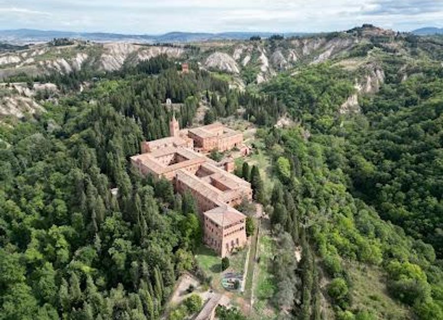 Explore the serene beauty and rich history of the Abbey of Monte Oliveto Maggiore, a hidden gem nestled in the heart of Tuscany.