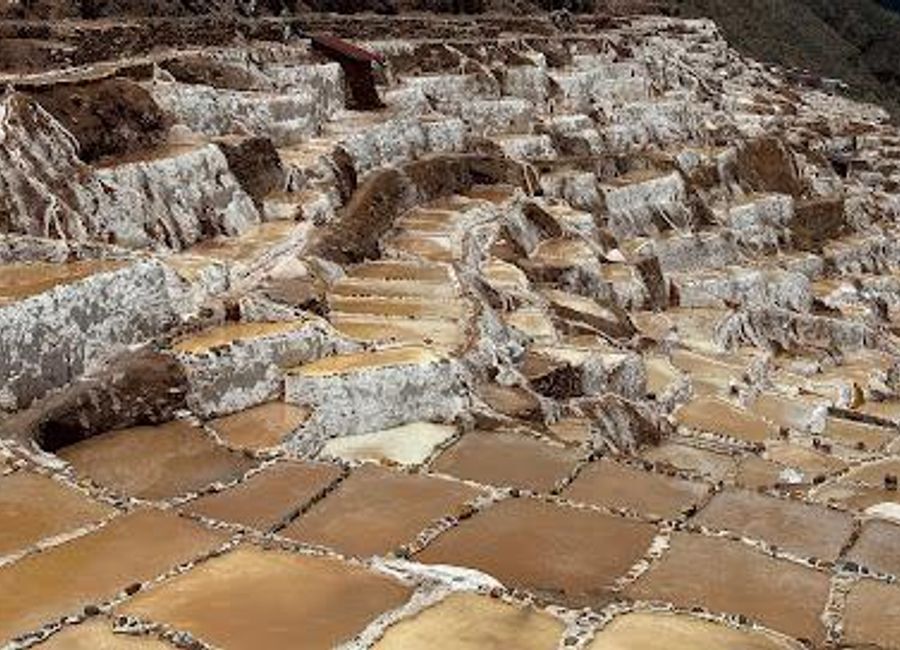 Explore the stunning Salt Mines of Maras in Peru's Sacred Valley, a UNESCO World Heritage site showcasing ancient salt extraction and breathtaking landscapes.