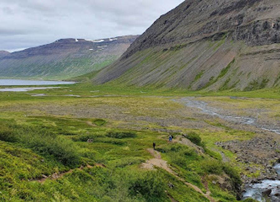Explore the enchanting Valagil Waterfall in Iceland, a natural wonder surrounded by stunning landscapes and rich folklore.