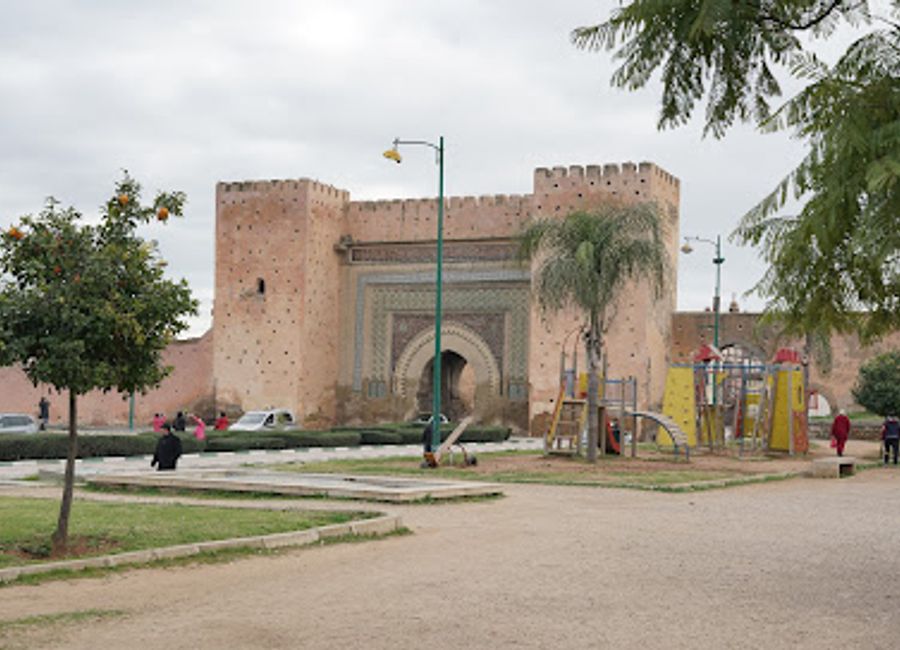 Explore Dar El-Makhzen in Meknes, a stunning royal palace showcasing Morocco's rich history and breathtaking architecture amidst lush gardens.