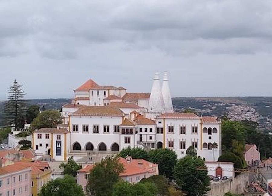 Experience the majestic beauty and rich history of the National Palace of Sintra, a UNESCO World Heritage site and architectural gem in Portugal.