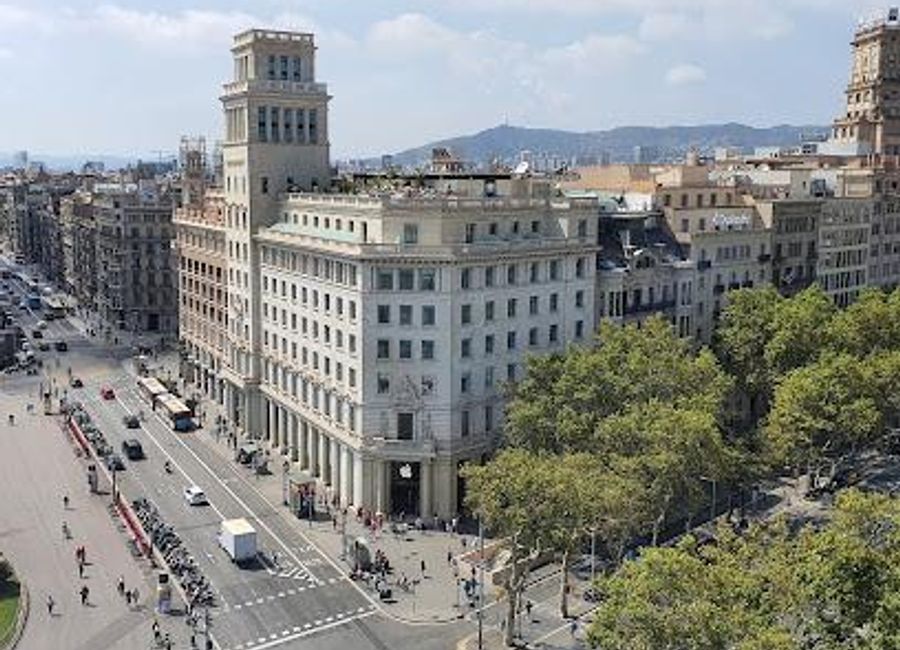 Discover the vibrant atmosphere of Plaça de Catalunya, Barcelona's iconic central square, perfect for shopping, dining, and cultural exploration.
