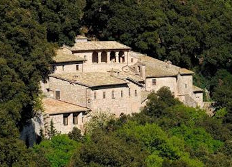 Discover the serene beauty of Eremo delle Carceri, a spiritual sanctuary nestled in the hills of Assisi, rich in history and natural tranquility.