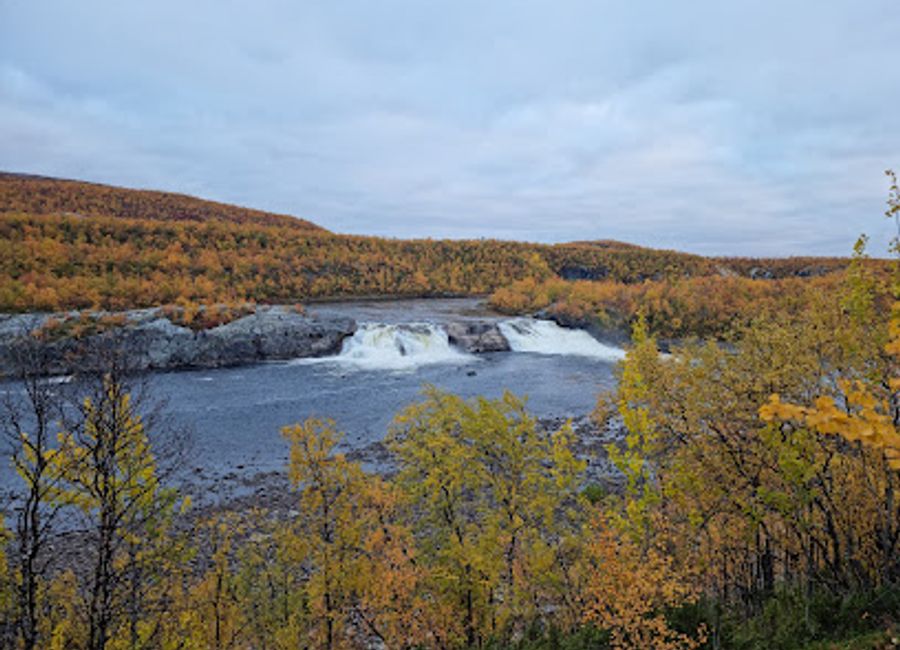 Experience the breathtaking beauty of Pikefossen Falls, a stunning waterfall in Kautokeino, Norway, perfect for nature lovers and photography enthusiasts.