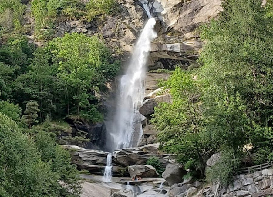 Experience the enchanting beauty of Cascata di Noasca, a stunning waterfall in Gran Paradiso National Park, perfect for nature lovers and adventurers alike.