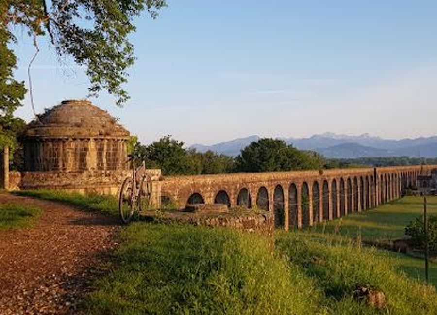 Explore the Acquedotto Nottolini, a stunning 19th-century aqueduct in Lucca, showcasing remarkable engineering and picturesque landscapes.