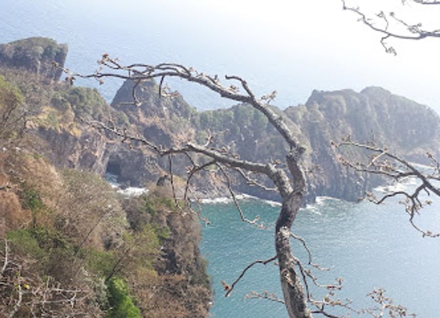 Hike to Mirante Ponta da Sapata for breathtaking panoramic views of Fernando de Noronha's dramatic coastline and abundant wildlife.