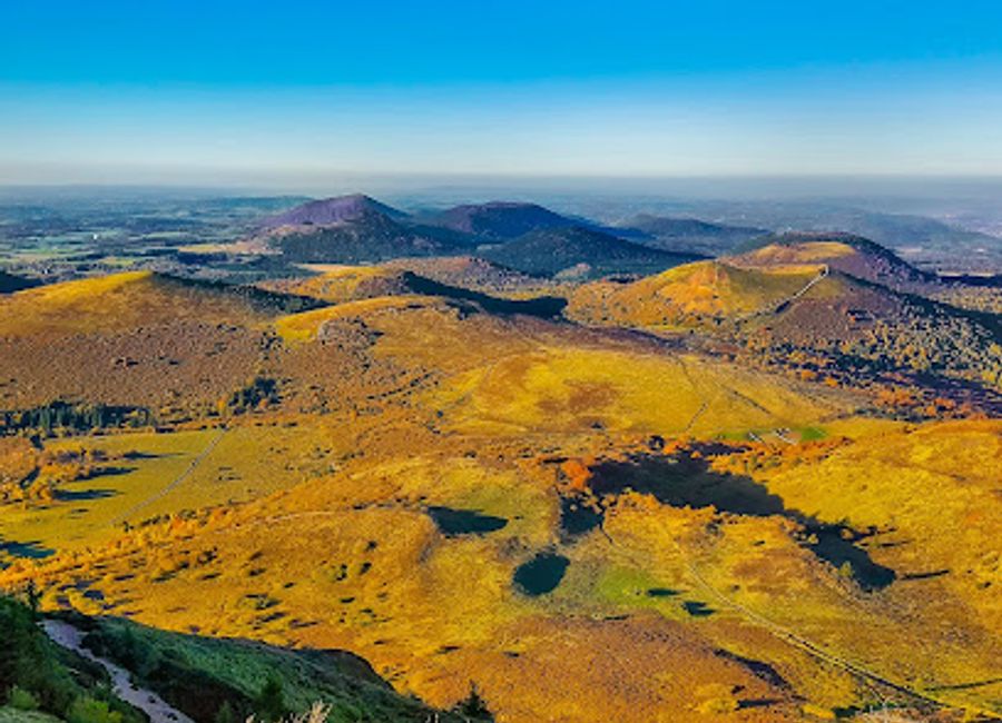 Explore the Chaîne des Puys, a UNESCO World Heritage site in Auvergne, France, offering stunning volcanic landscapes, diverse hiking trails, and a unique geological experience for nature lovers.