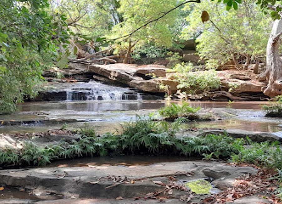 Experience the enchanting beauty of KPRIA Waterfall in Bele, a serene escape surrounded by lush landscapes and natural wonder.