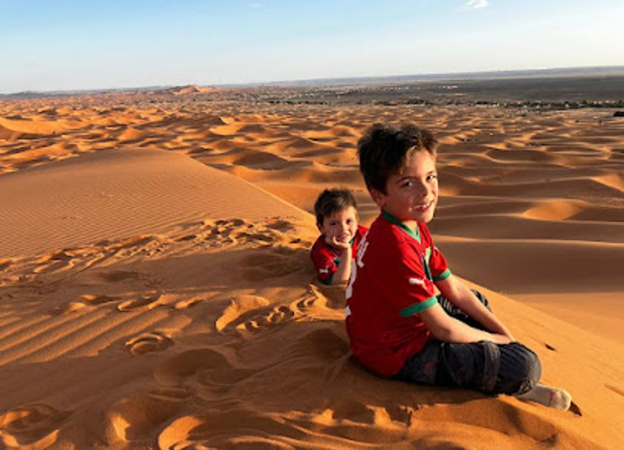Experience the breathtaking beauty of Lala Lallia Gran Dune in Morocco, where golden sands meet vibrant sunsets in the heart of the Sahara Desert.