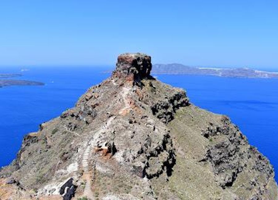 Explore Skaros Rock in Imerovigli, Santorini - a stunning natural fortress with breathtaking views and rich history, perfect for every adventurous traveler.