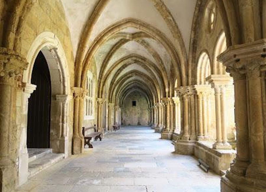 Discover the architectural beauty and historical significance of the Old Cathedral of Saint Mary of Coimbra, a must-see landmark in Portugal's cultural heart.