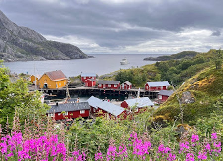 Explore the stunning natural beauty and rich maritime heritage at Nusfjord Lighthouse in Ramberg, Norway, a must-see attraction for all travelers.