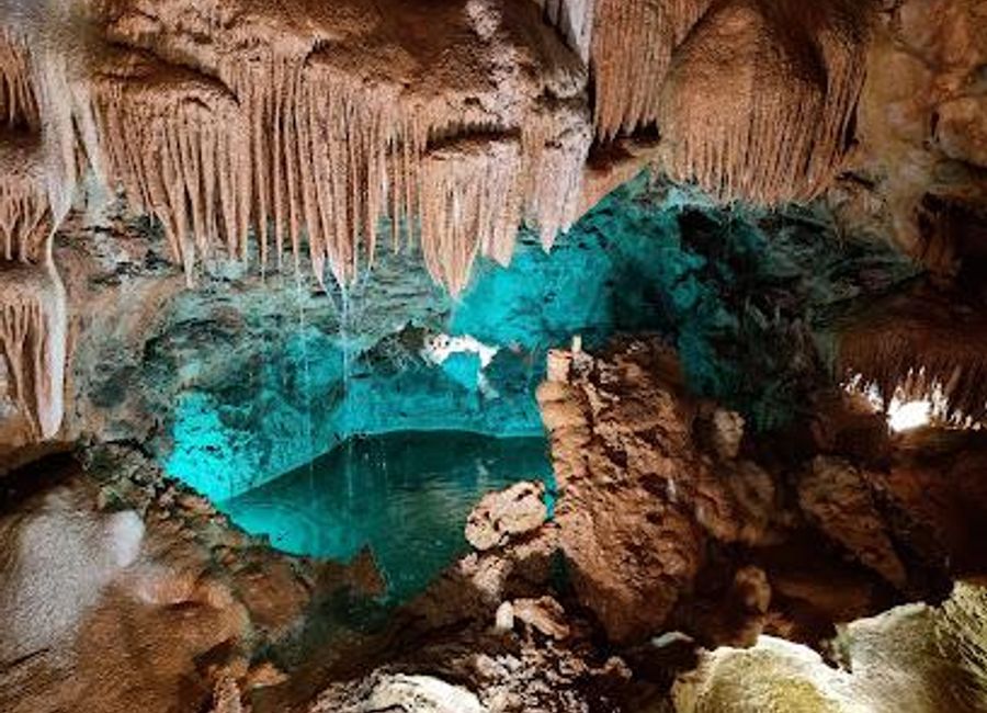 Explore the stunning Mira de Aire Cave, a natural marvel in Portugal offering breathtaking rock formations and an unforgettable underground adventure.
