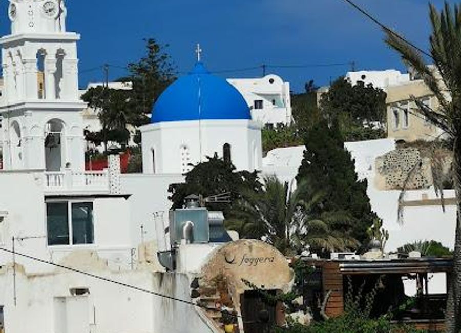 Experience the enchanting village of Megalochori in Santorini, where traditional charm meets breathtaking landscapes and local wine delights.