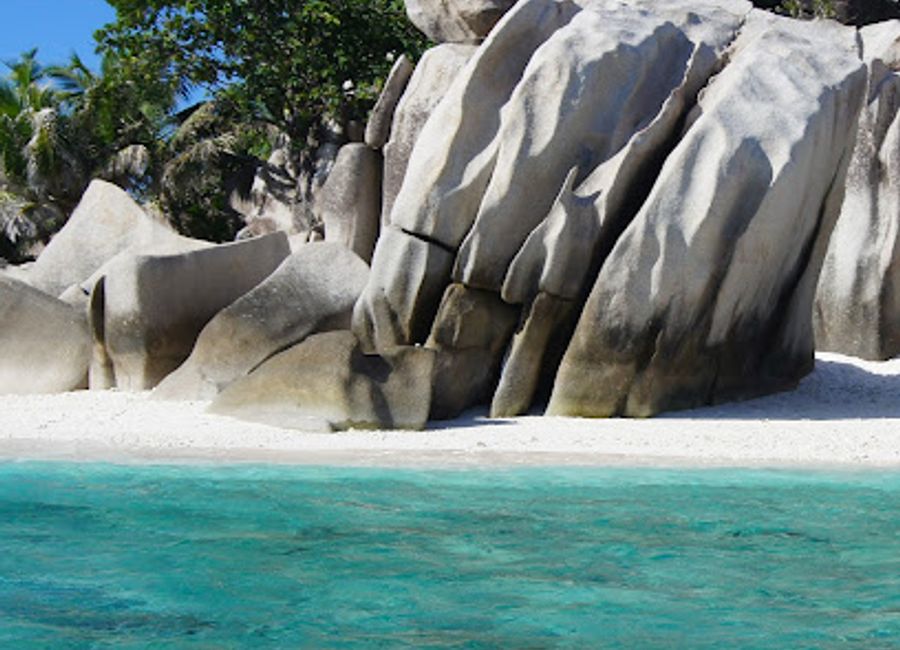 Explore the stunning beauty of Anse Bonnet Carre in Seychelles, a tranquil beach perfect for relaxation, snorkeling, and connecting with nature.