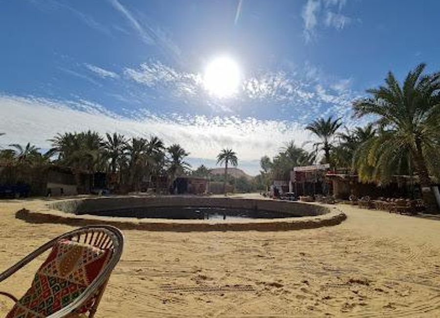 Experience the serene beauty and healing waters of Cleopatra's Pool in Siwa Oasis, a historical gem in the heart of Egypt's western desert.