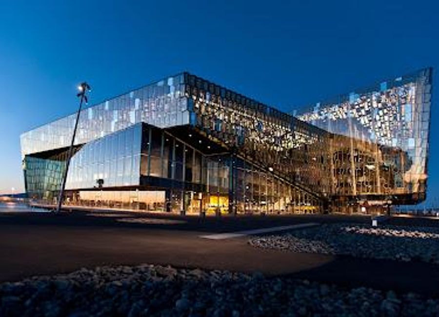 Discover the stunning Harpa Concert Hall in Reykjavik, a cultural hub that blends exceptional architecture with vibrant artistic performances.