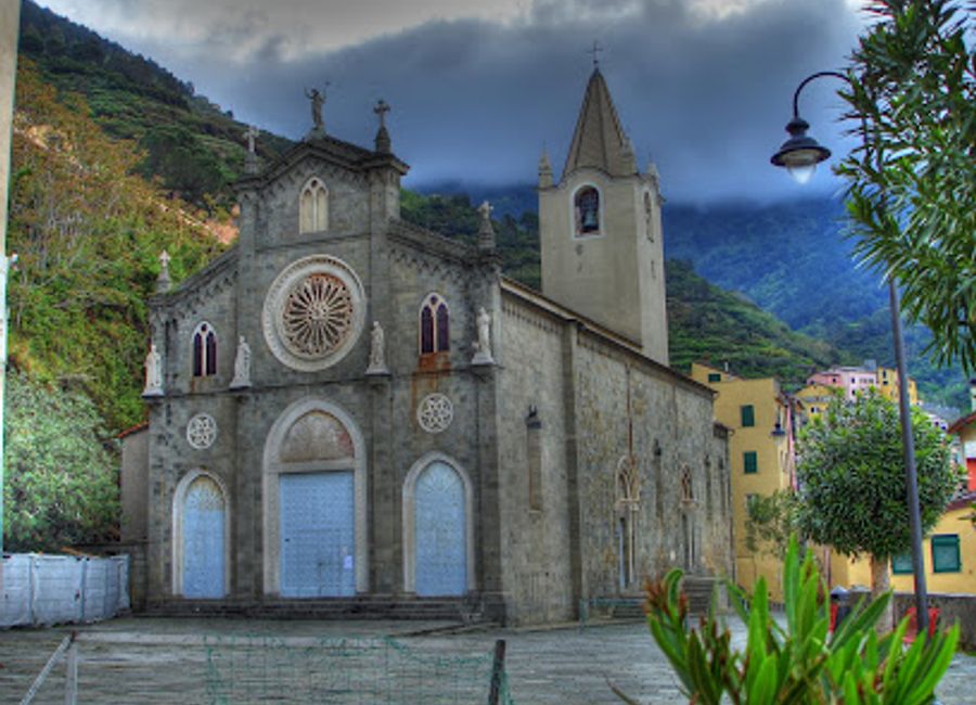 Discover the historic Church of San Giovanni Battista in Riomaggiore, a serene landmark rich in culture and breathtaking coastal views.