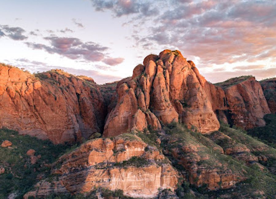 Soar above the breathtaking Bungle Bungles with HeliSpirit for an unforgettable helicopter adventure in Purnululu National Park.