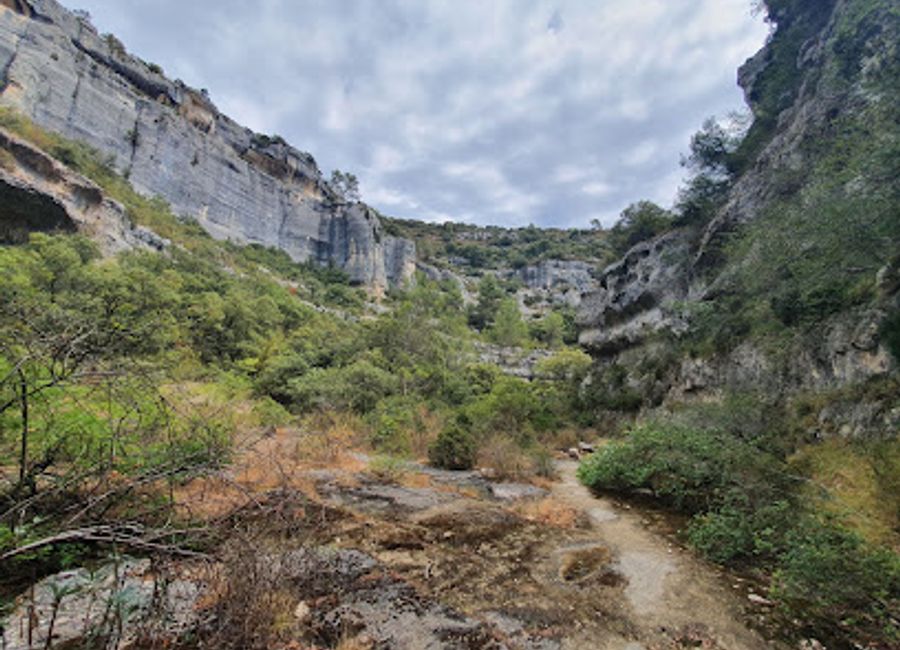 Discover the dramatic beauty and ancient history of Les Gorges de Véroncle near Gordes, where stunning cliffs meet the remains of historic watermills in the heart of the Luberon.