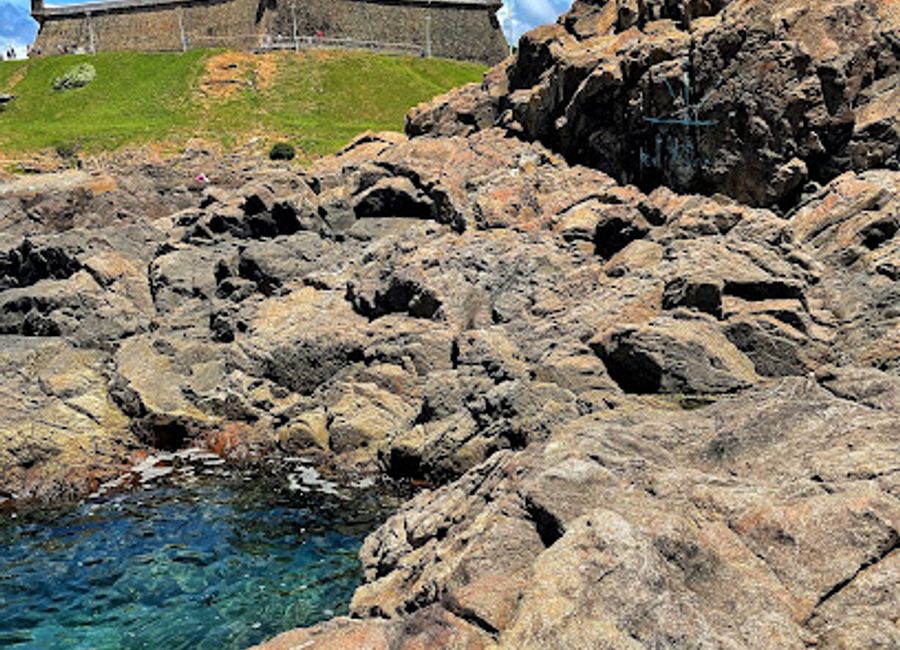 Discover Buraco da Sereia, a serene paradise in Salvador's coastline, where turquoise waters and stunning vistas await your exploration.
