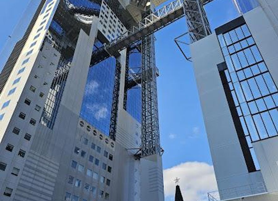 Discover Osaka's skyline at Umeda Sky Building, an architectural gem offering breathtaking views and a vibrant dining scene.