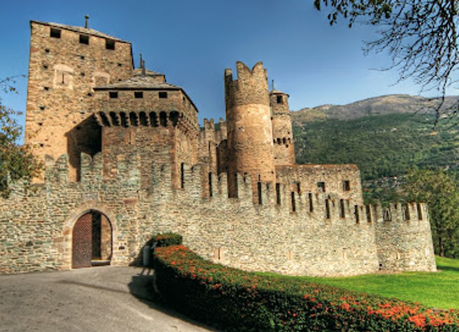 Explore the enchanting Castello di Fénis in Aosta Valley, a medieval masterpiece showcasing Italy's rich history and stunning architecture.