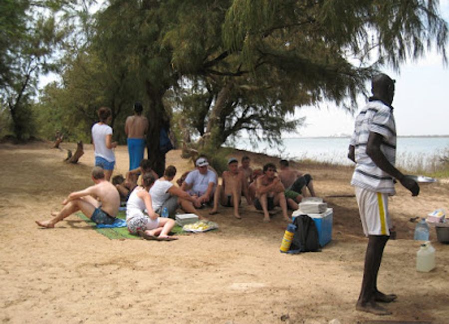 Experience the tranquil beauty of Langue de Barbarie, a nature preserve where the Senegal River meets the Atlantic Ocean, perfect for nature lovers and adventurers.
